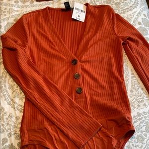 Brand new rust color body suit